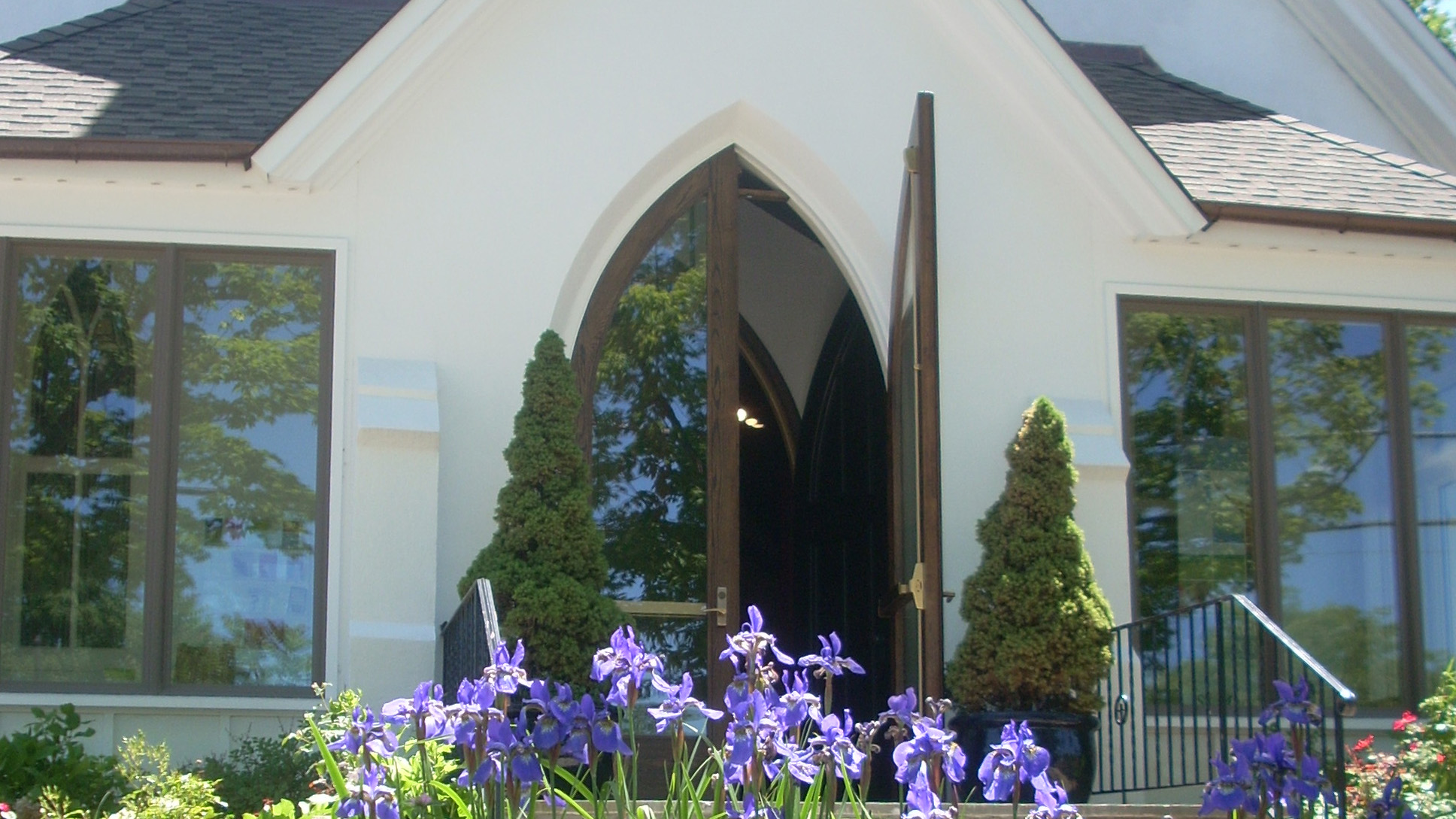church front door with flowers